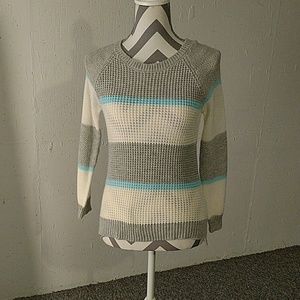 Striped knit sweater.